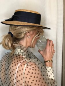 Suz hat drinking water
